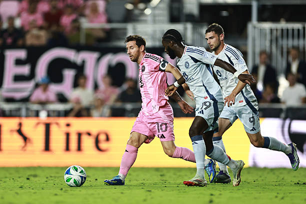 Inter Miami and Chicago Fire players competing in an MLS match