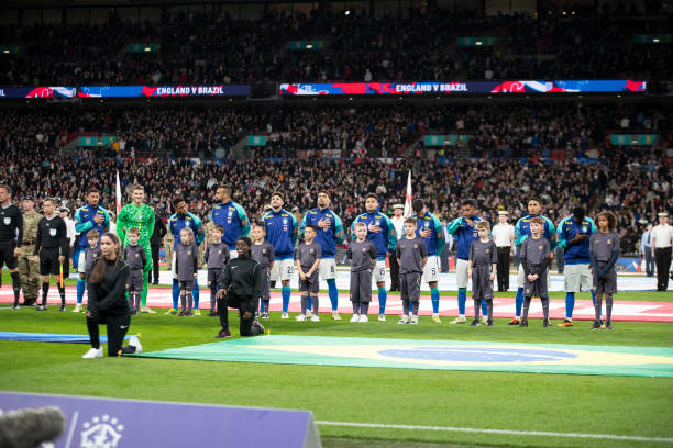 England national football team and Brazil national football team players before an international football match
