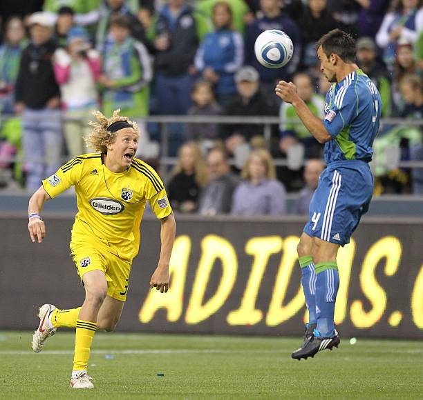 Columbus Crew vs Seattle Sounders match featuring two players battling for possession during an exciting MLS game